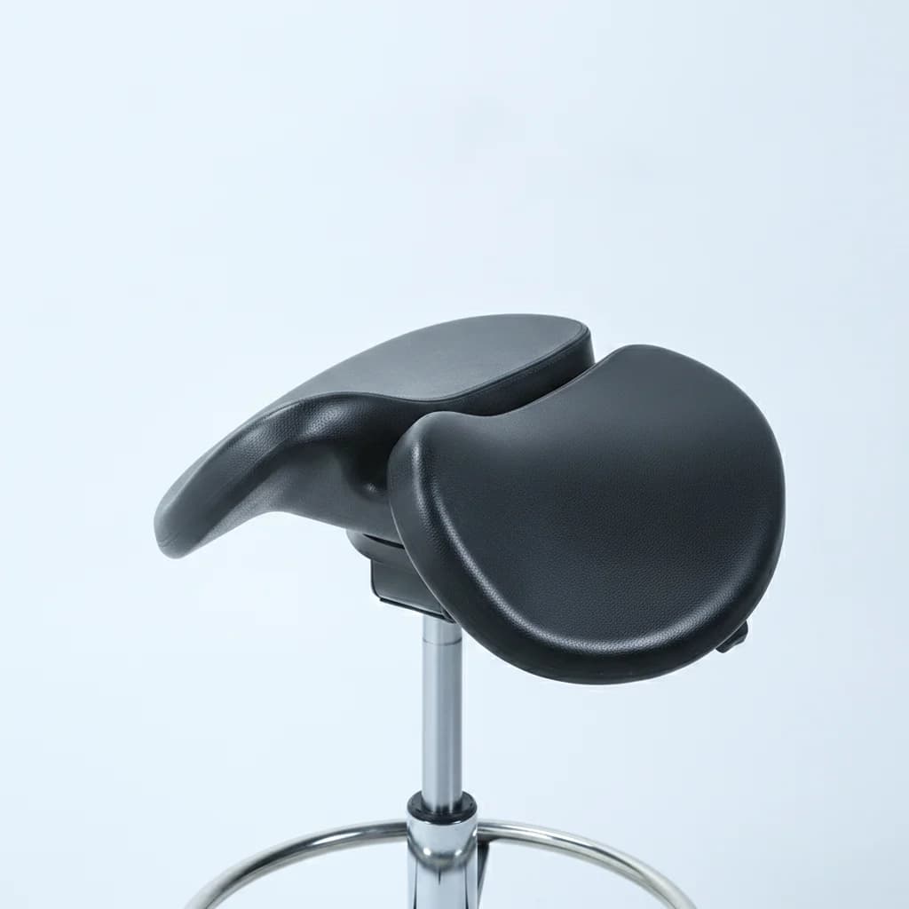 Contoured saddle seat of the active stool