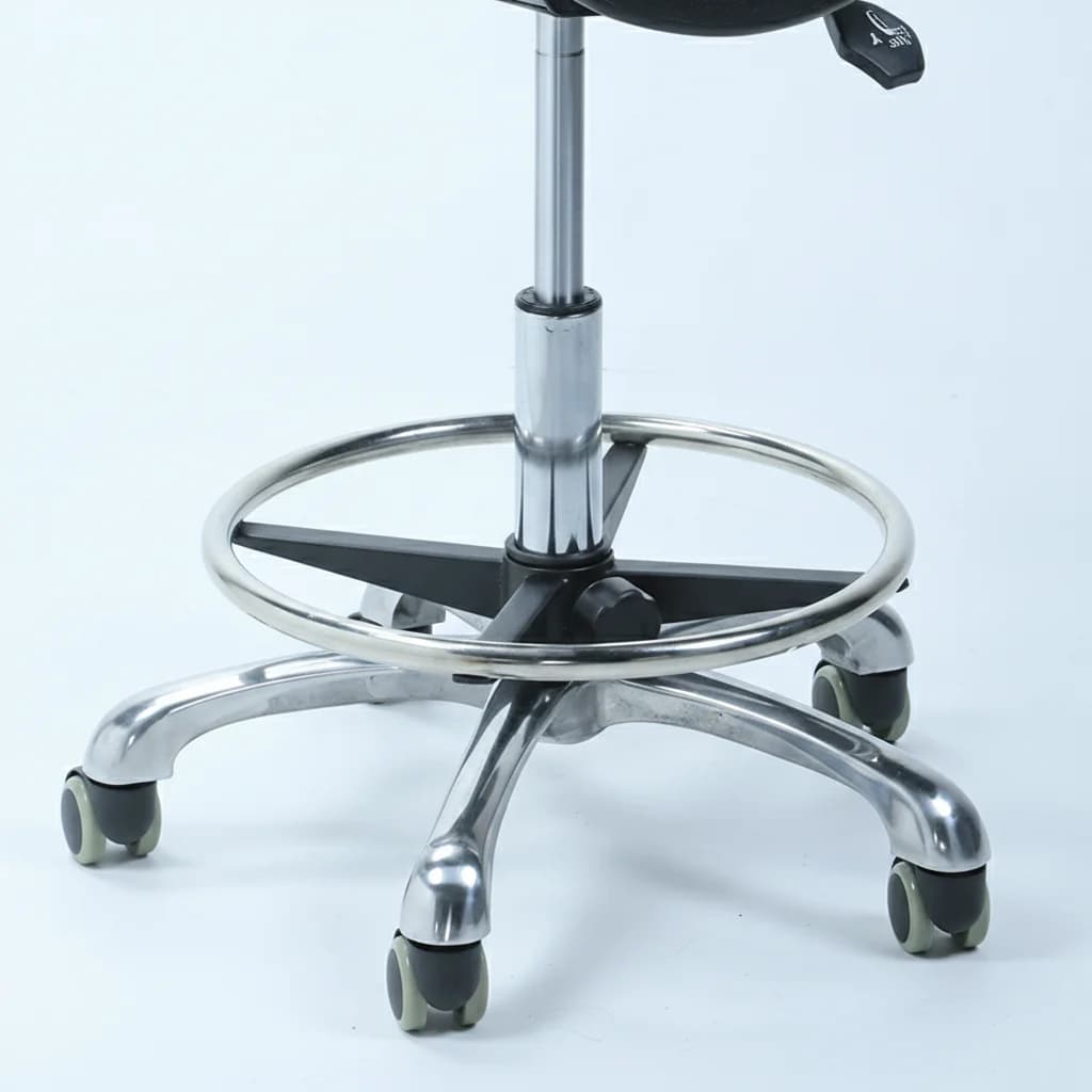 Close-up of the saddle stool footring and caster base