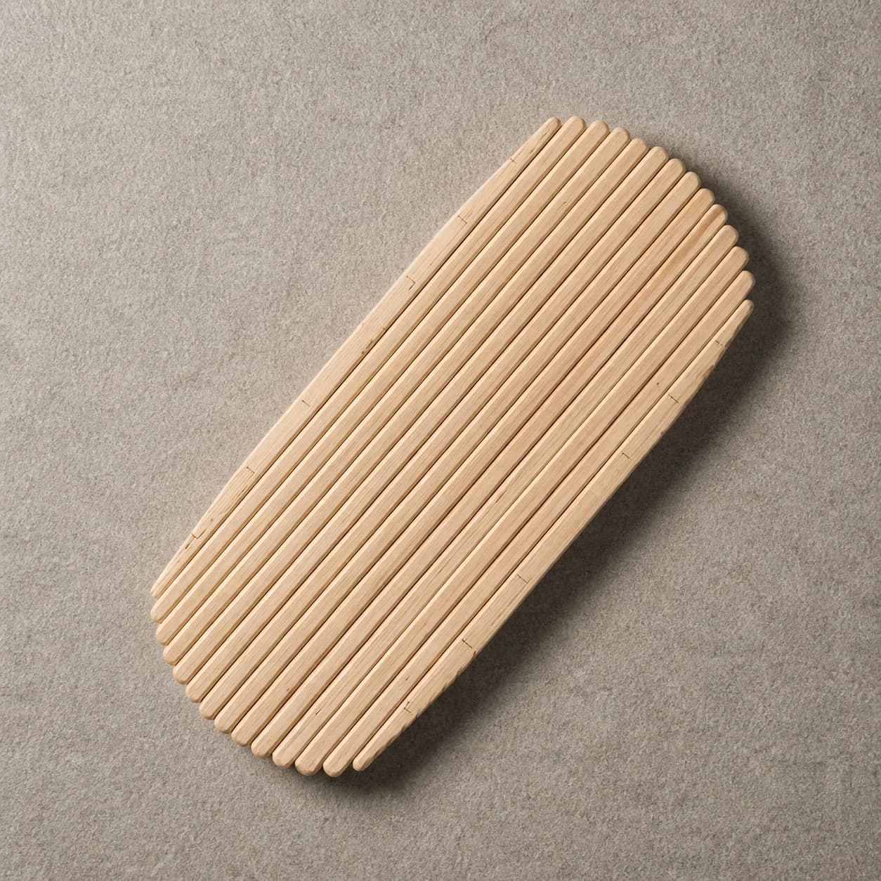Higher-angle view of the ErgoSway ribbed wooden balance board