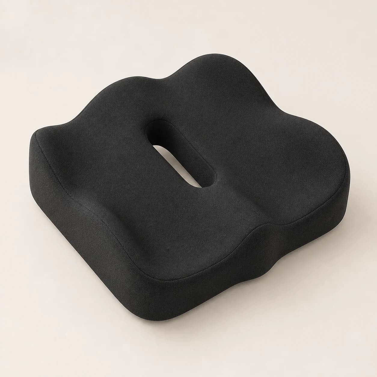 Angled studio view of the black SeatNest contour and central rear opening