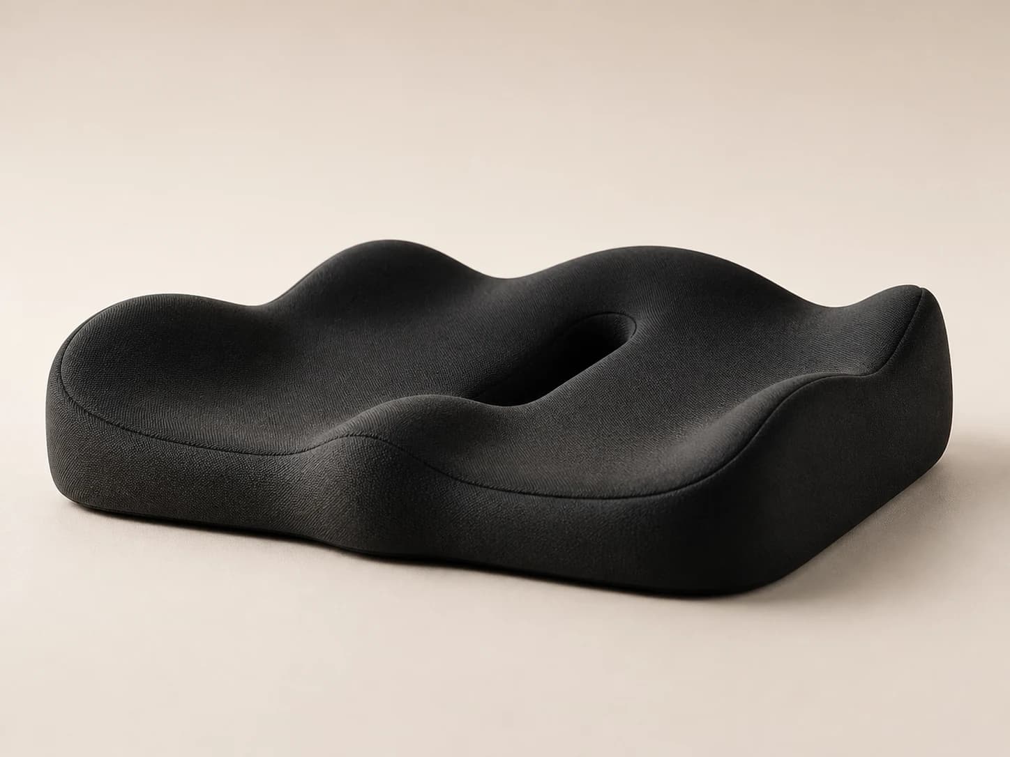 Side profile showing SeatNest raised edges and lower front contour