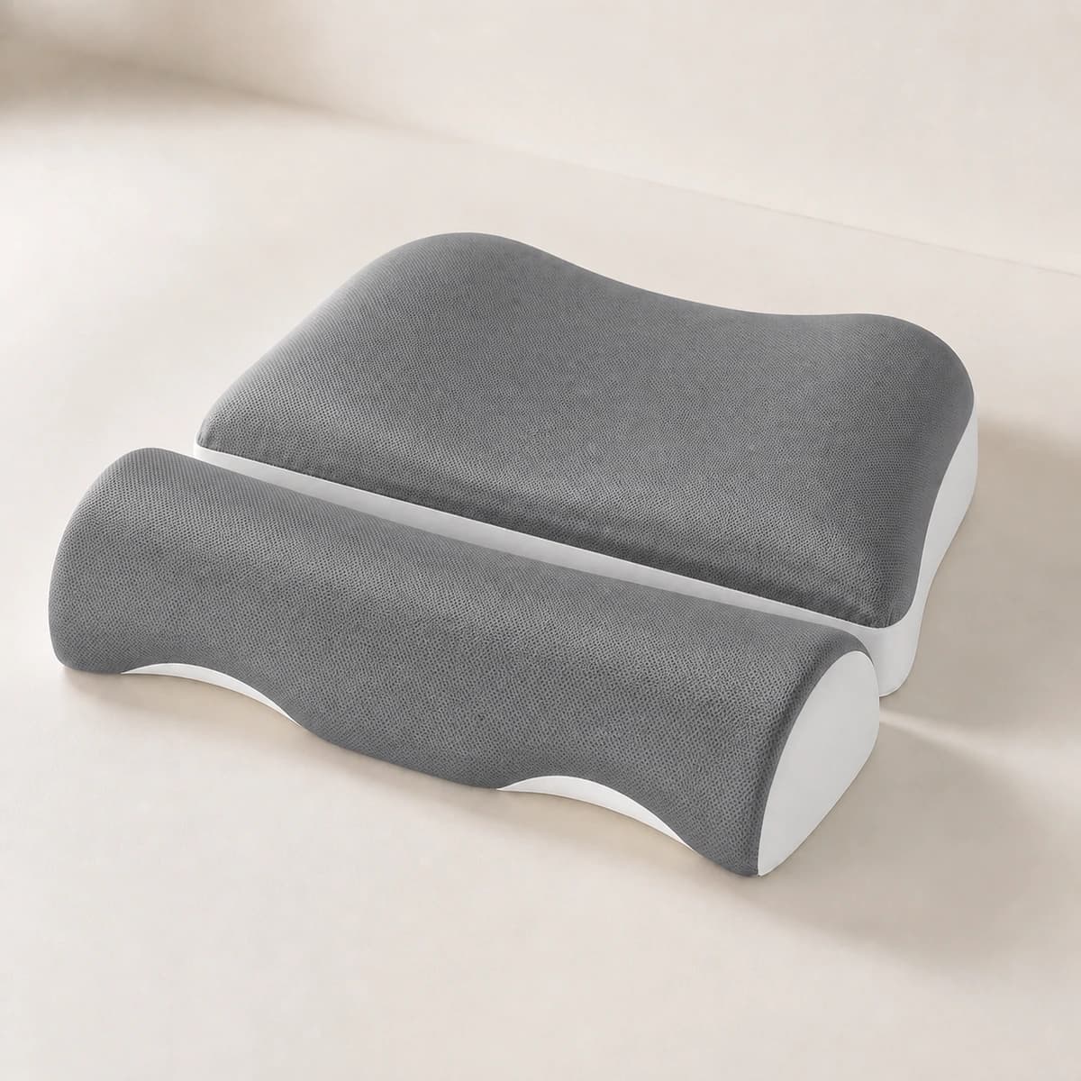 Angled studio view showing CloudArc's separate rear head pad and front cervical bolster