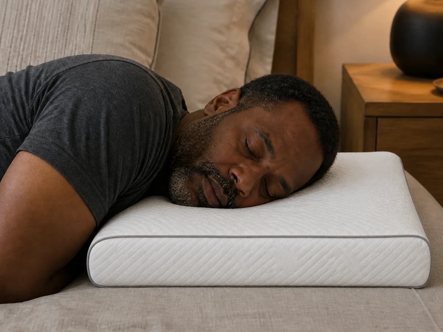 Adult side sleeper using WaveRest with the shoulder remaining on the mattress