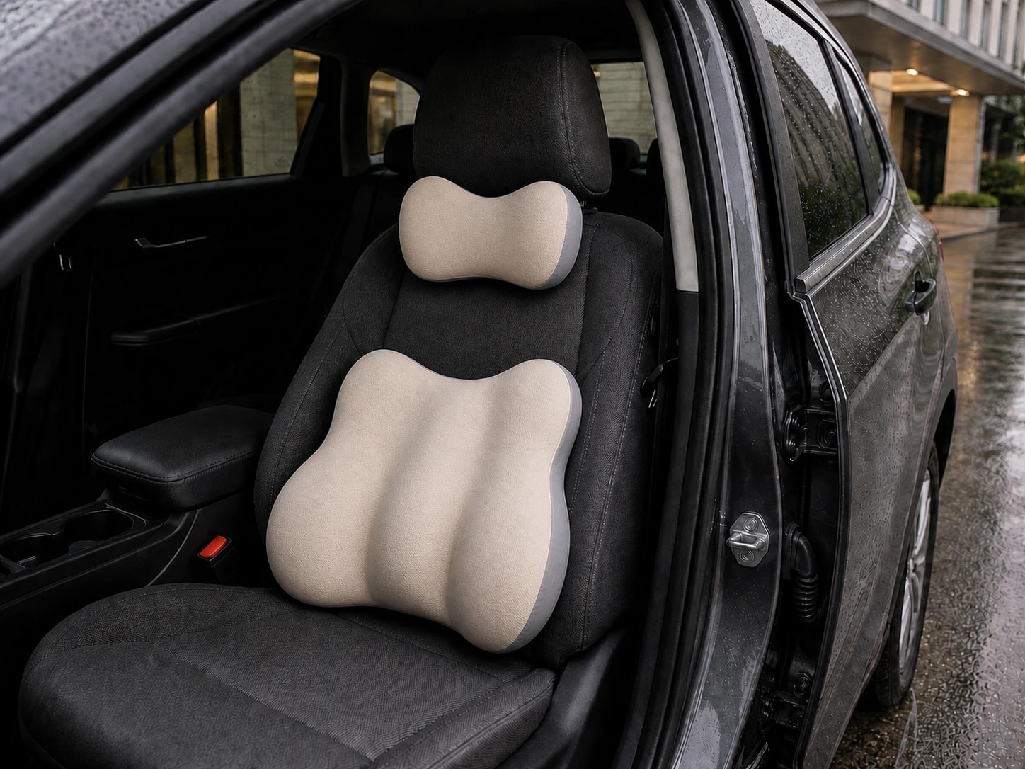 DriveNest Duo installed on an empty passenger seat in a parked car after rain