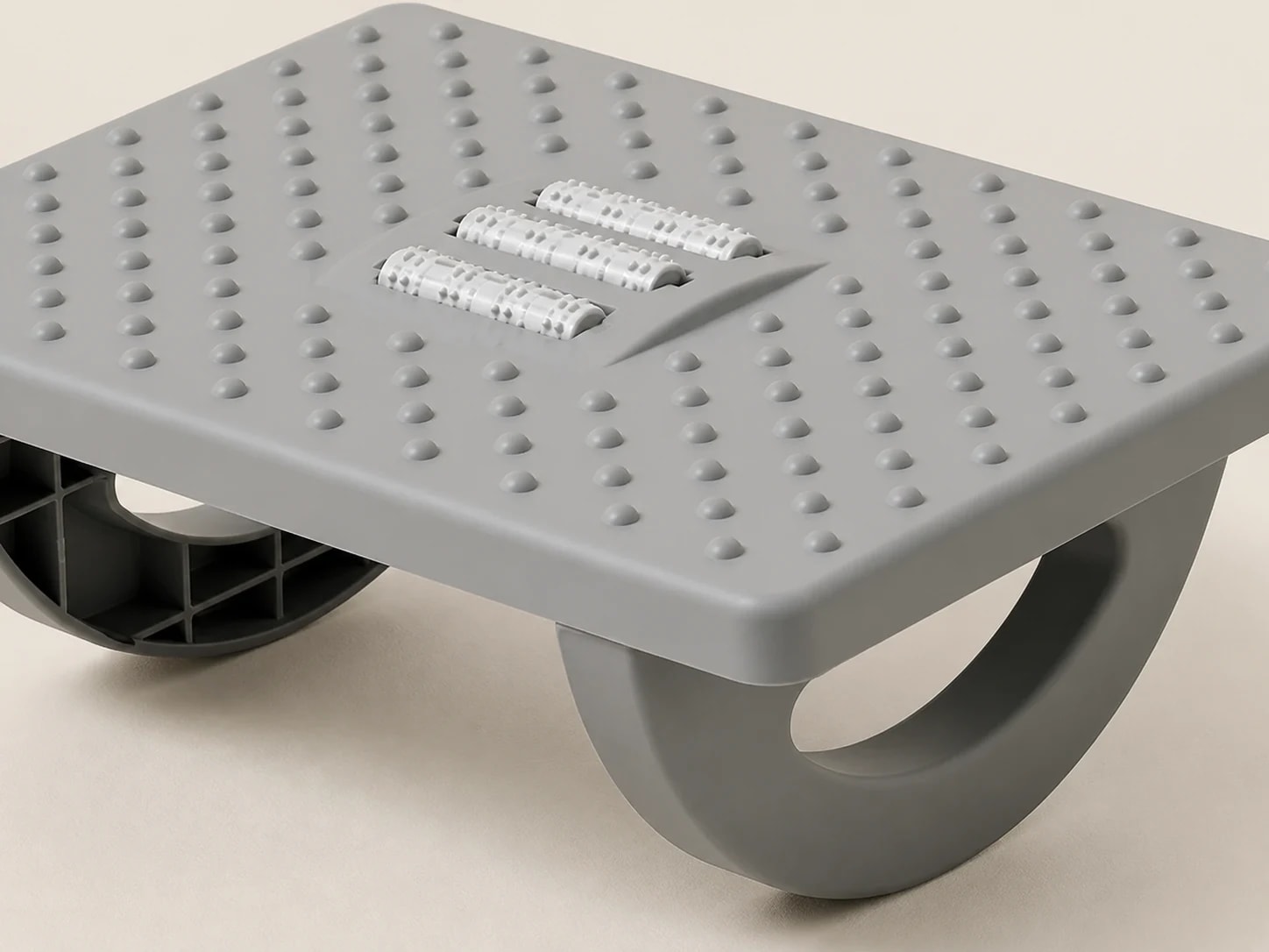 Close-up of the gray RollArc deck, rounded points, roller tracks, and curved support
