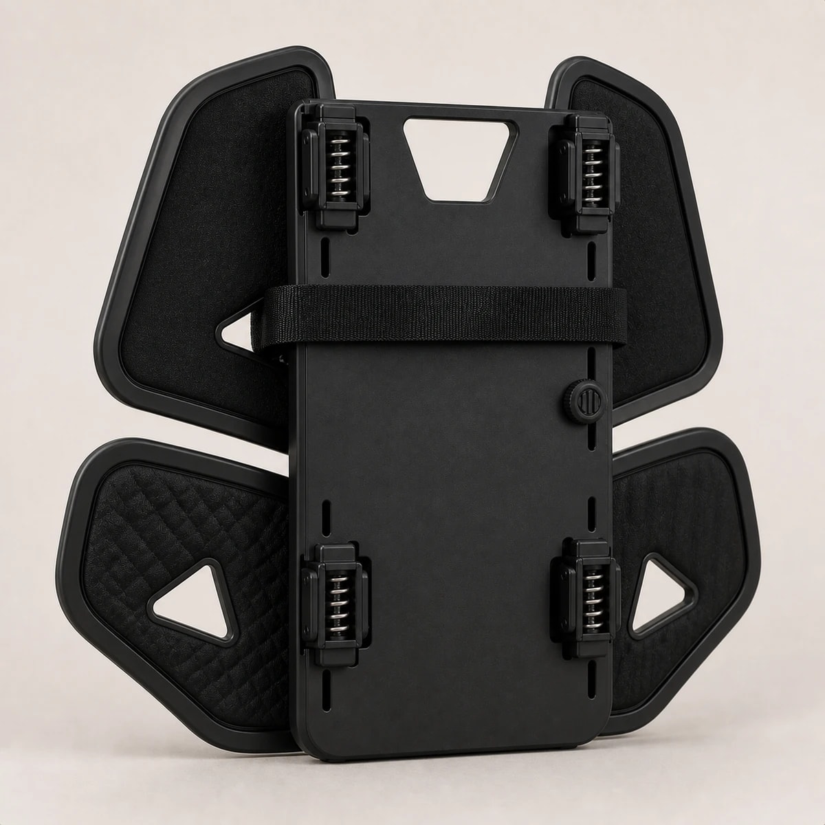 Rear studio view of the DriveFlex 4 backplate, four spring mounts, securing strap, and adjustment slot
