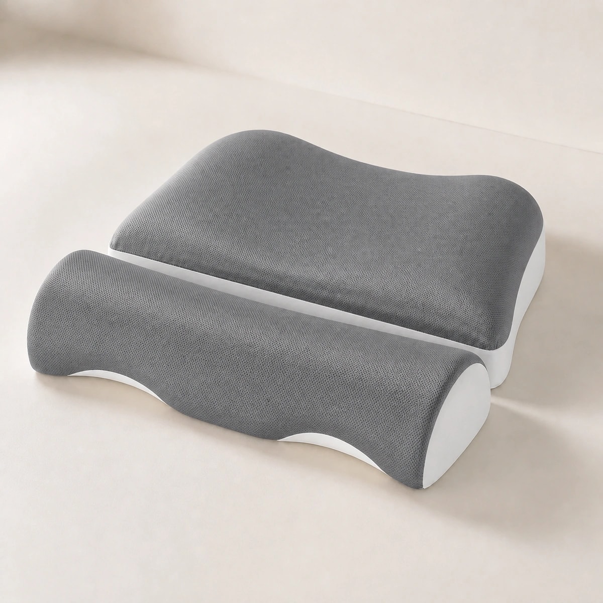 Angled studio view showing CloudArc's separate rear head pad and front cervical bolster