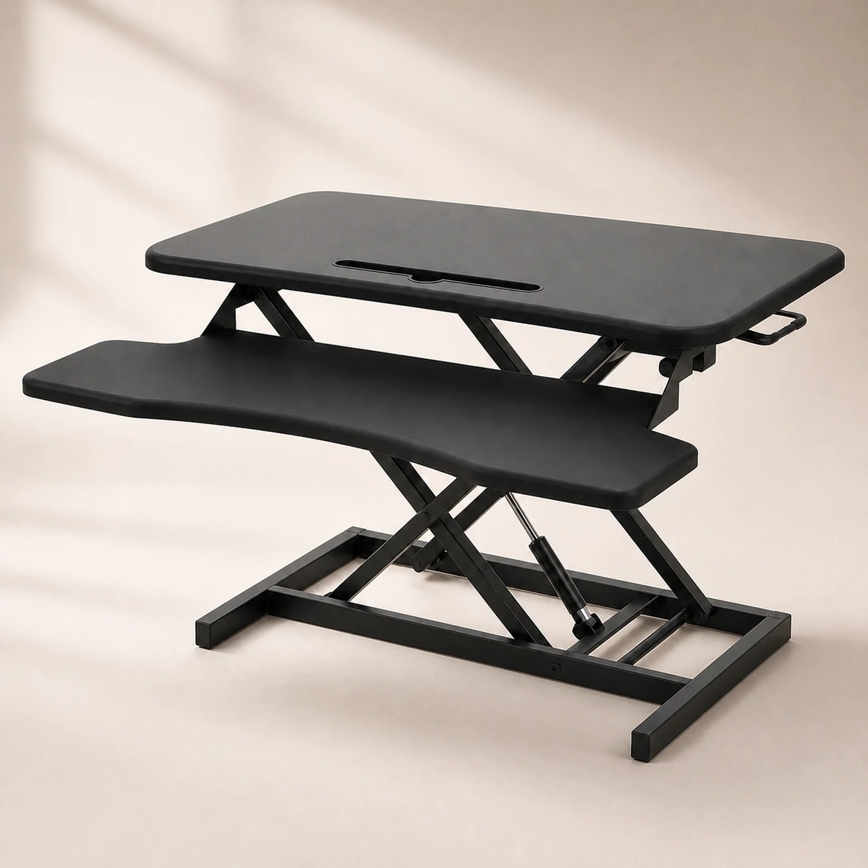 Black two-tier SwiftLift desk riser with separate keyboard tray on a warm studio background