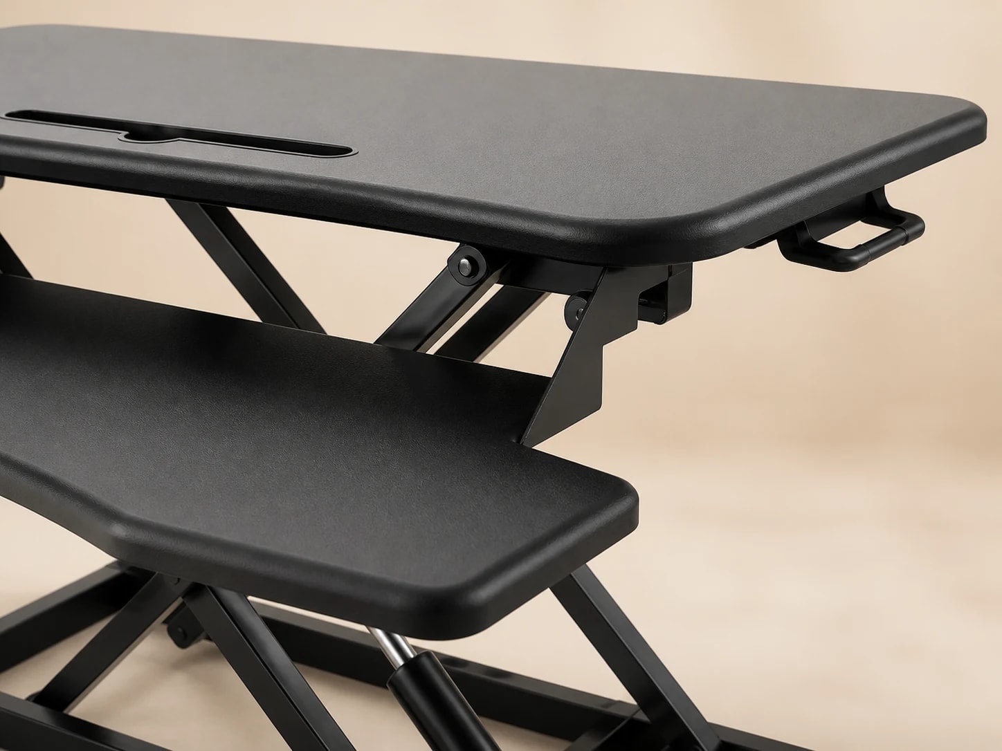 Close-up of the SwiftLift upper platform, lower tray, control, pivot, and black frame