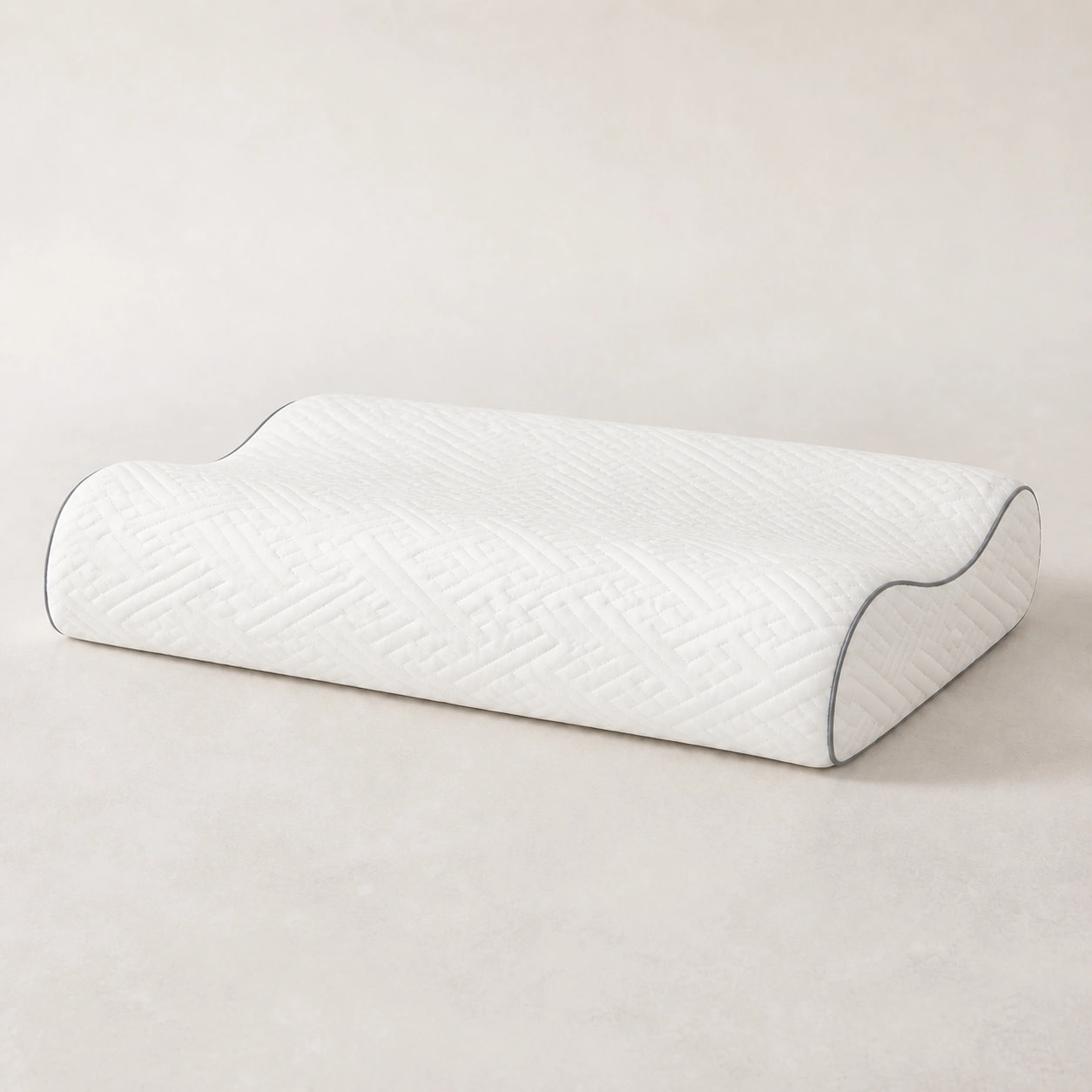White low-profile WaveRest 7/9 cm Memory Pillow with maze-pattern cover and dark piping