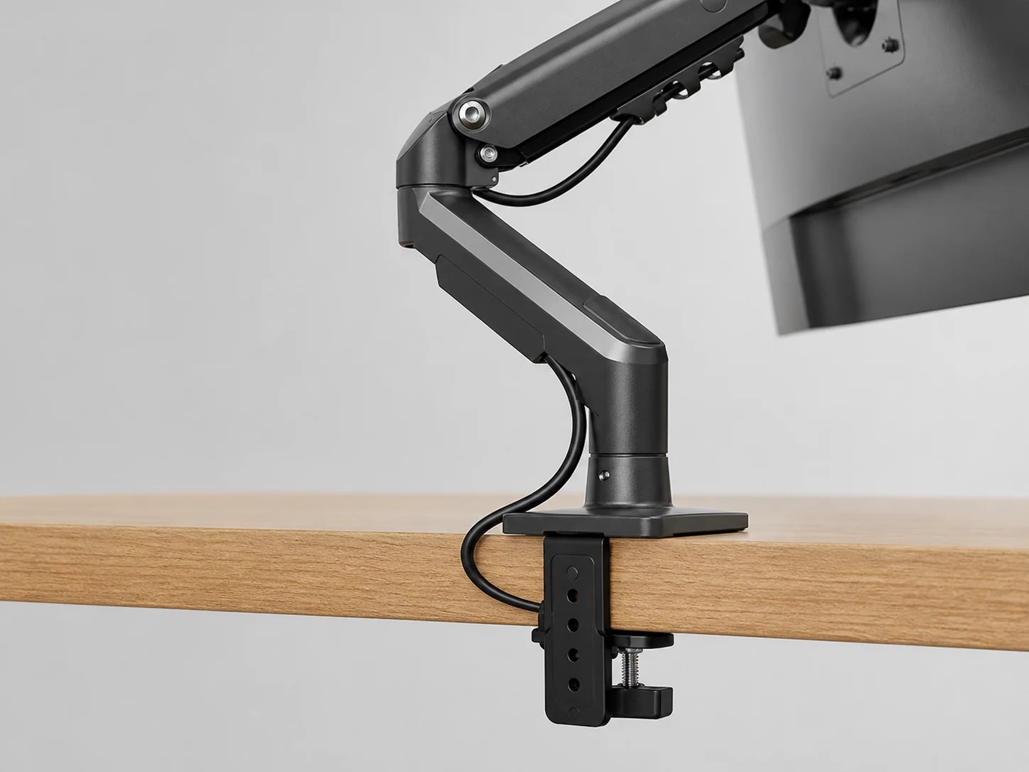 Close view of the ViewGlide clamp base and cable routed along the arm