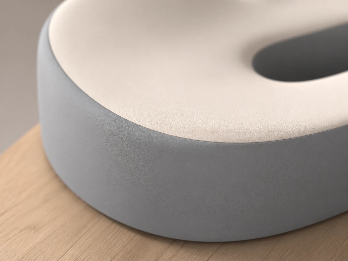 Close-up of the cream upper surface and gray side wall on the Memory Foam Seat Cushion