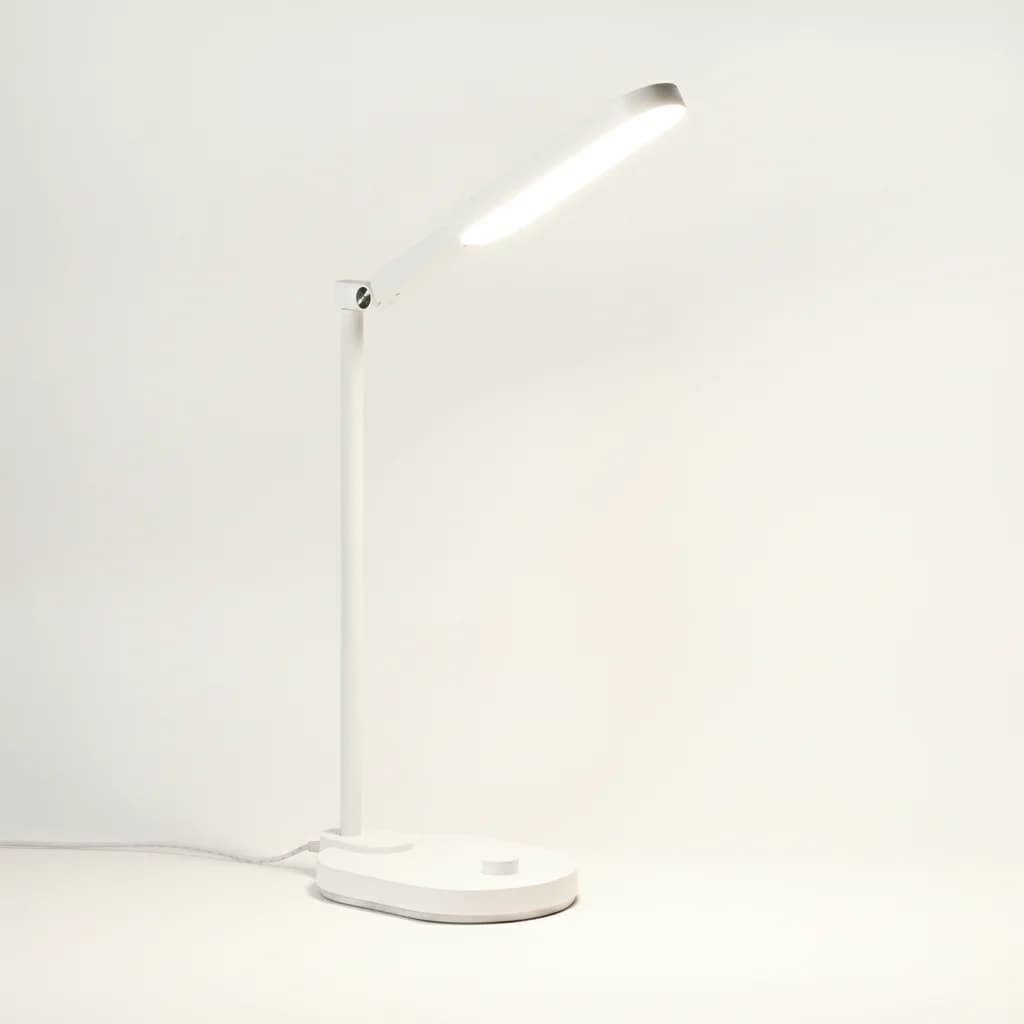 Wide LED light bar spreading even light across a desk