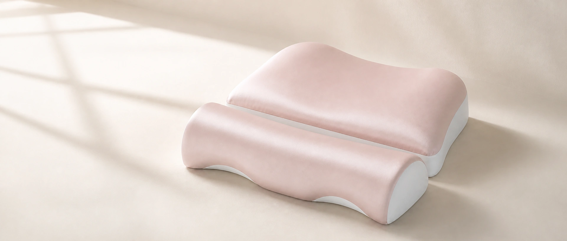 CloudArc Neck Pillow showing its separate rear head cradle and front cervical bolster