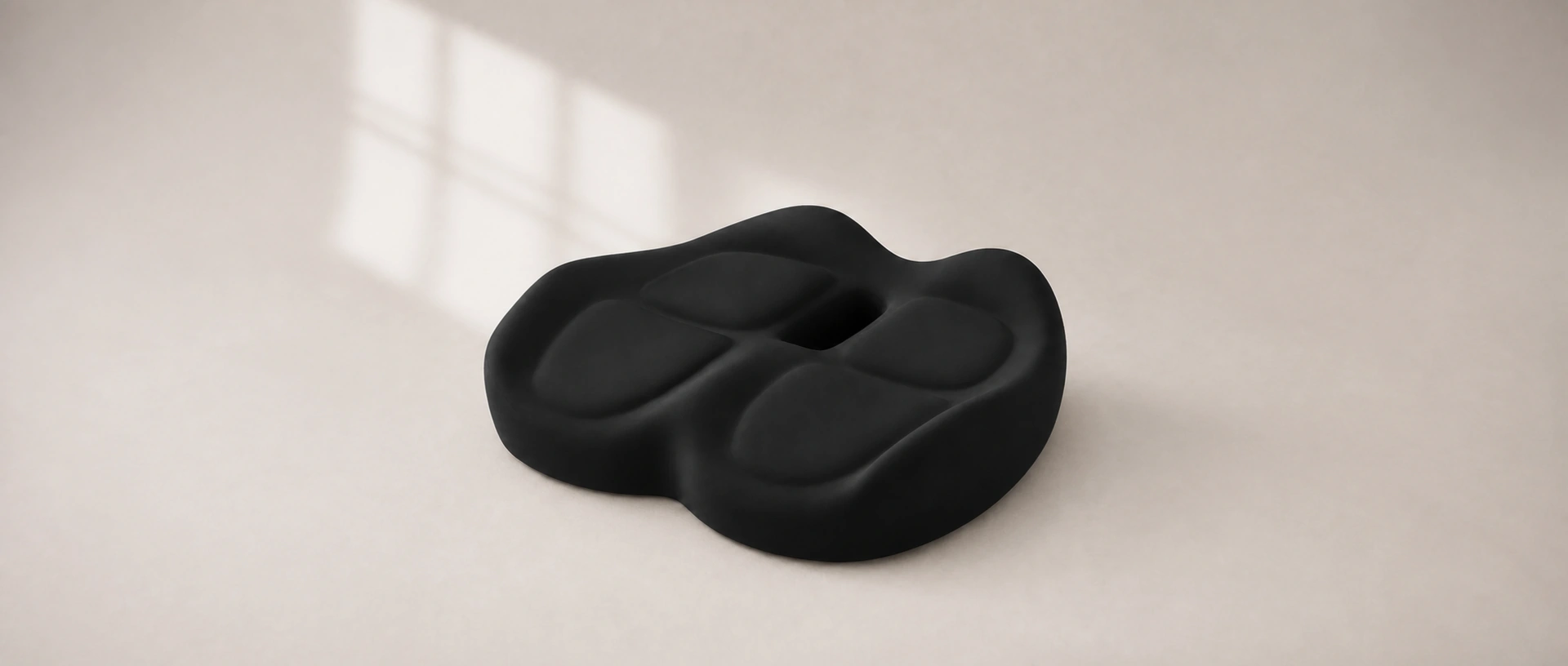 ContourX Seat Cushion showing its broad raised zones and central opening