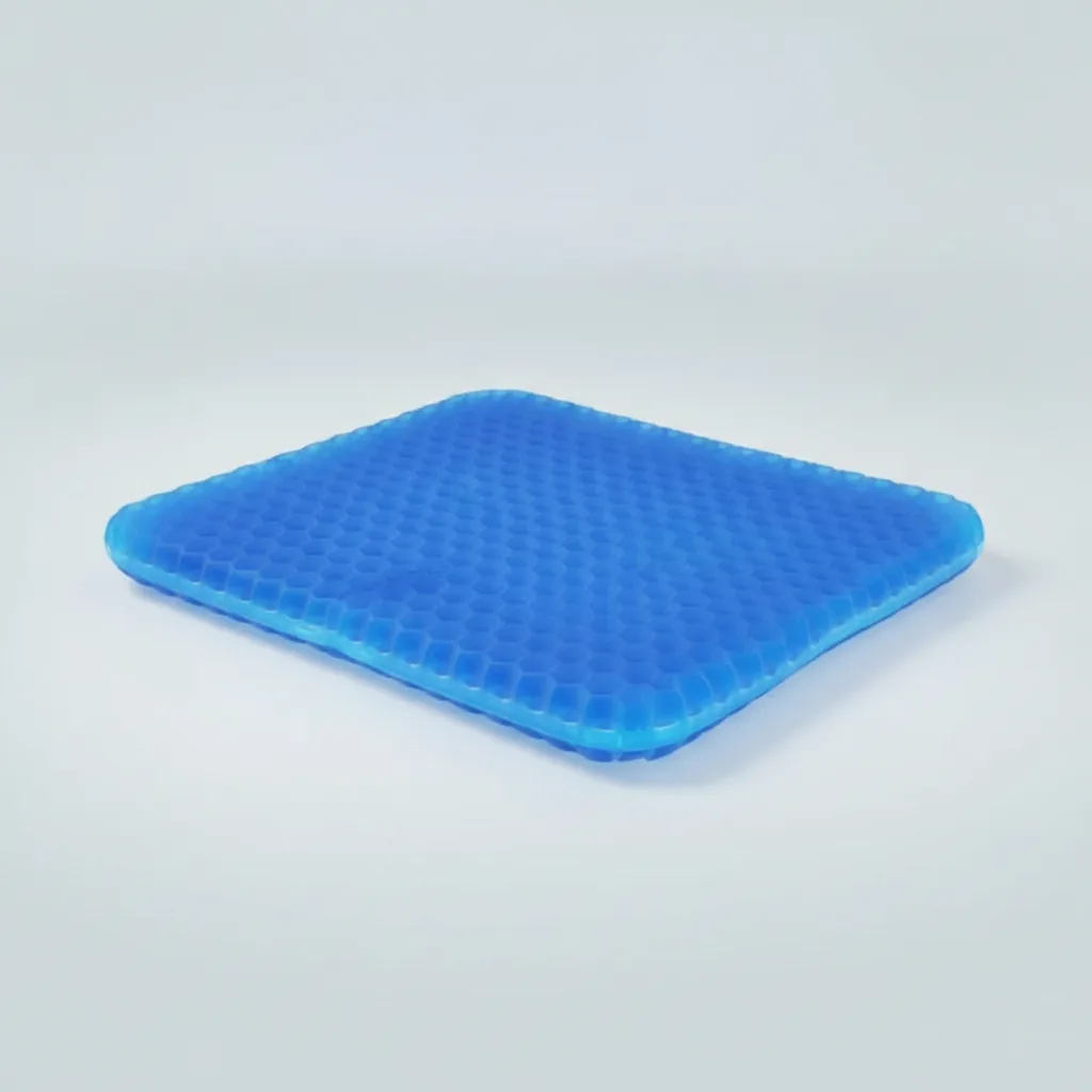 Gel seat cushion with a cooling gel layer over firm foam that spreads pressure under the sit bones